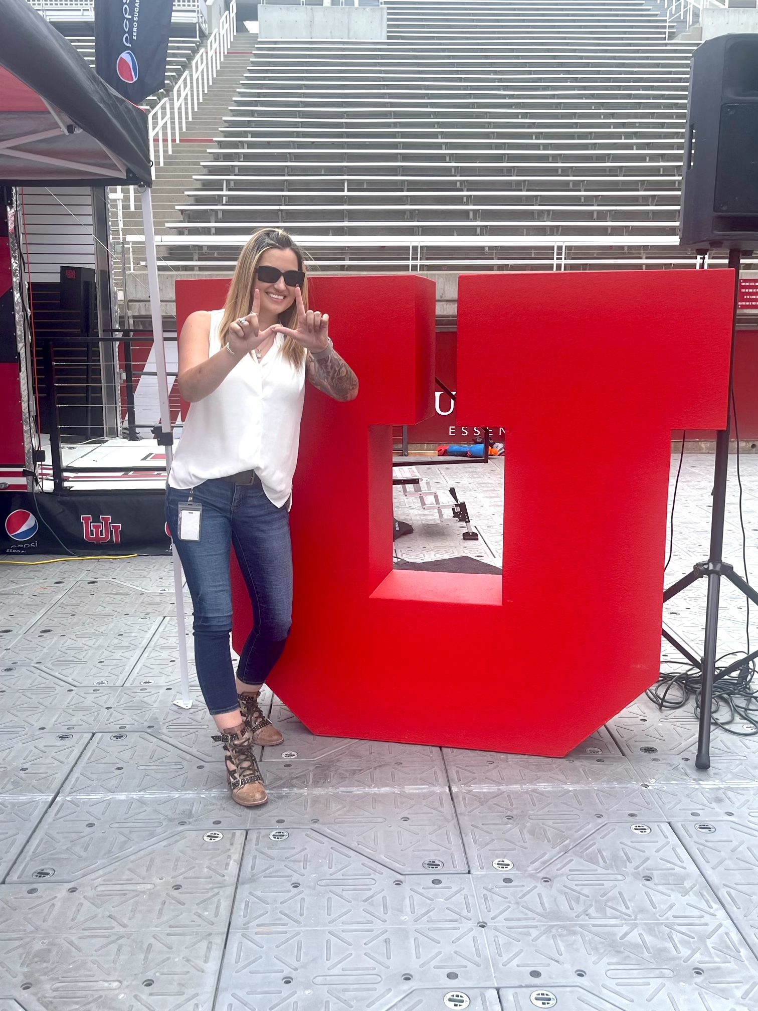 Amy at the U Amy in front of the "U" sign at the University of Utah