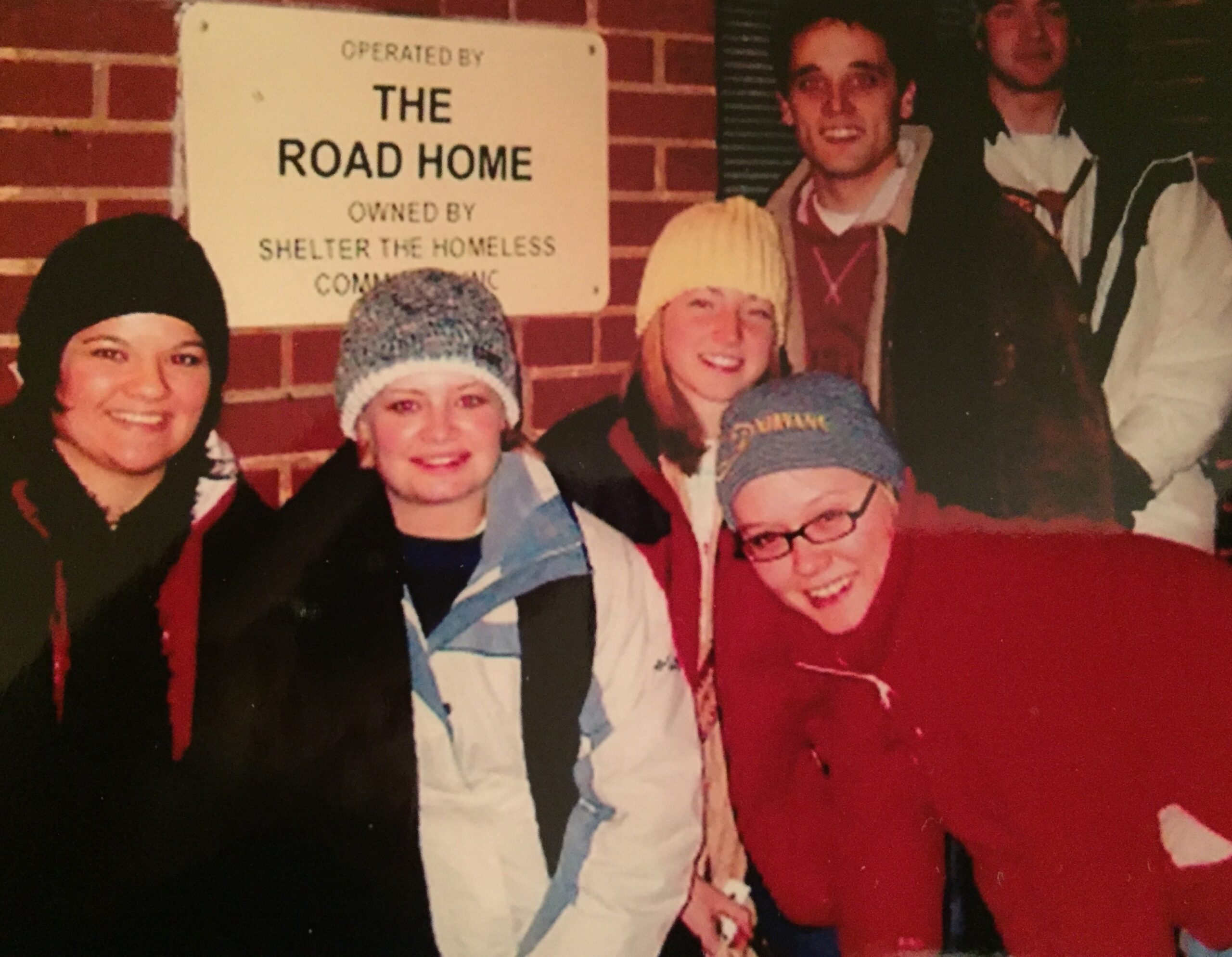Noella volunteering at the Road Home in college through the Bennion Community Service Center, 2005