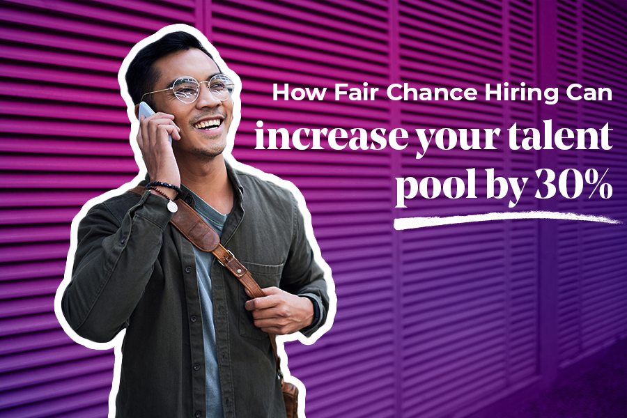 Image of a man holding a smart phone smiling. Text reads: How fair chance hiring can increase your talent pool by 30%